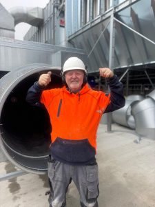 Tony shows off his clip on electronic ear defenders